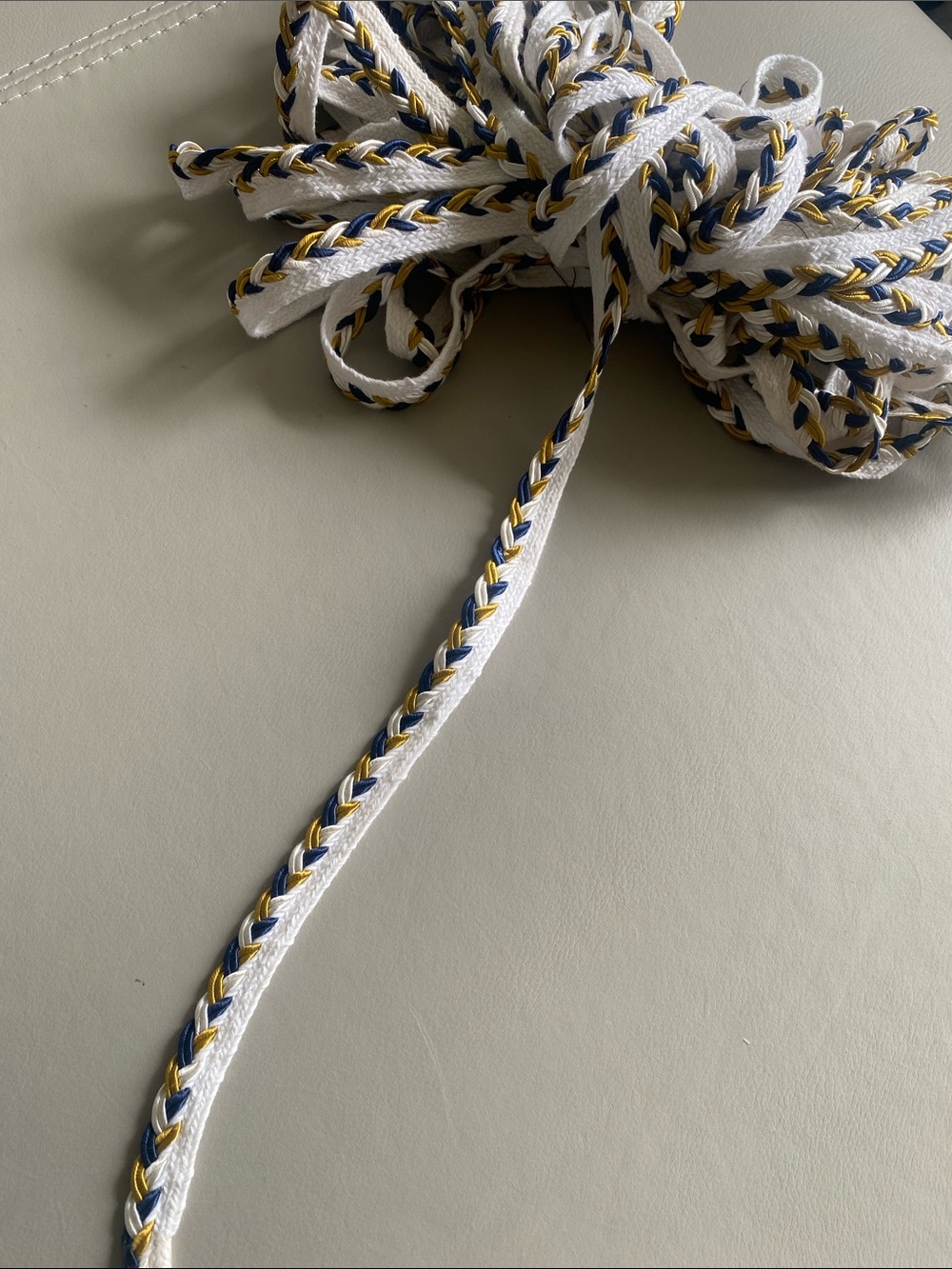 Braided White trim with Navy and Gold Accent sold by the yard